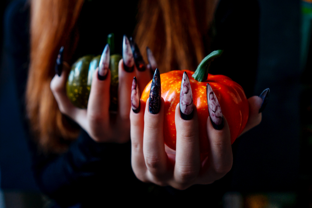 Halloween Nail Art Design, hands and decorations.