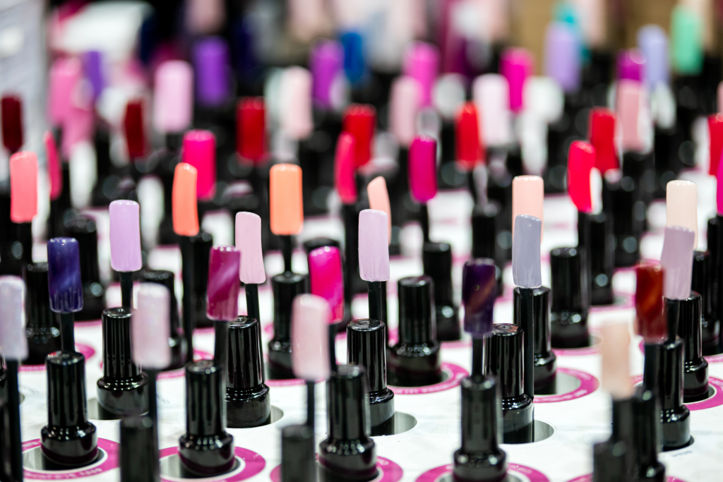 Nail polish samples on desk in beauty store